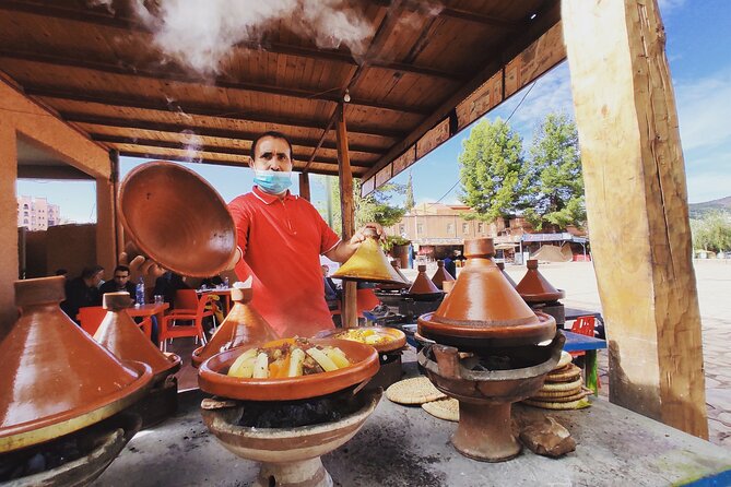 From Marrakech: Full-Day Tour to Ouzoud Waterfalls With Boat Trip - Visit Berber Villages and Swim in the El Abid River
