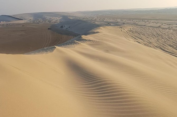 Private Qatari Desert ATV Adventure From Doha - Pricing and Reservation Details