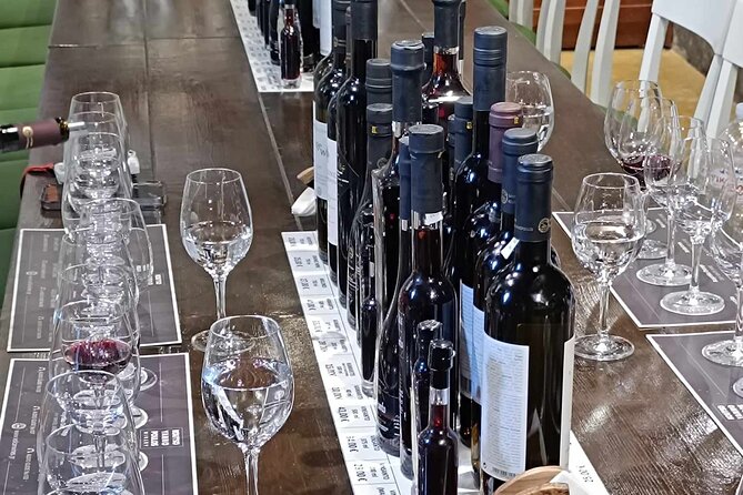Private Wine Visit in Fira With 12 Wine Tastings and Tapas - Immersive Wine Culture Exploration