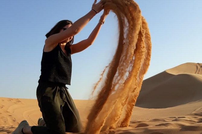 Red Dunes Safari With Sandboarding & Camel Ride From Ras Al Khayma - Cancellation Policy and Traveler Reviews