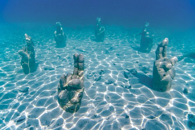 Top Isla Mujeres Catamaran Tour With Snorkel Open Bar and Buffet Lunch - Directions