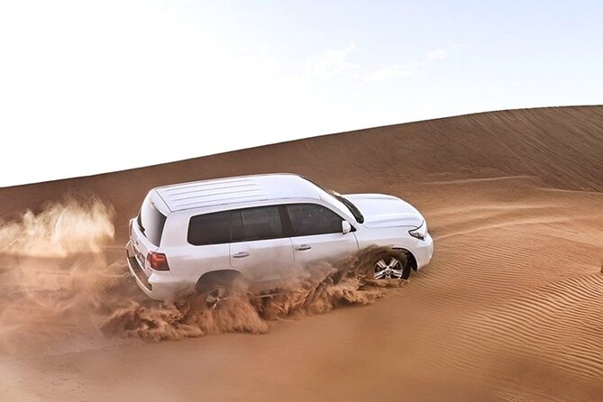 4 Hrs Safari Dune Bashing, Camel Ride,Inland Sea, Pickup Service.