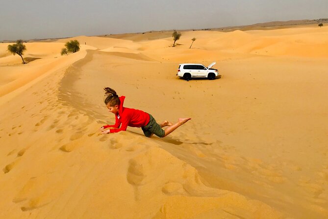 Abu Dhabi Morning Desert Safari,Dune Bashing,Sandboarding,Camel Riding&Quad Bike - Adrenaline Rush: Quad Biking