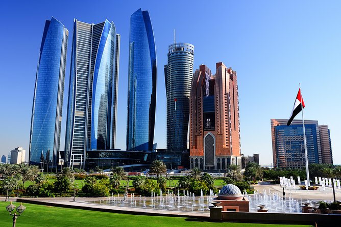 From Abu Dhabi: City Tour With Royal Palace & Sheikh Zayed Mosque - Locations, Bus, and Viator Experience