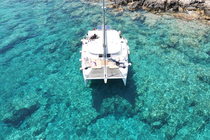 Full-Day Exclusive Catamaran Cruise in Kaş With Lunch - Pricing, Copyright, and Terms & Conditions