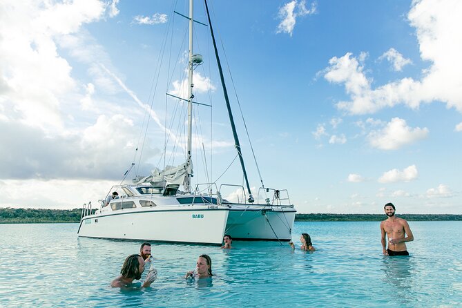 New! Catamaran Cruise With Open Bar Through the 7 Colors Lagoon - Cancellation Policy