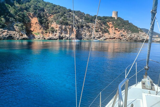One Day Excursion on a Sailing Boat in the Gulf of Alghero - Common Questions