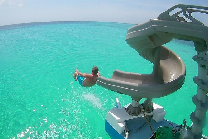 Private Catamaran Adventure Cruise With Rope Swing and Water Slide - Cancellation Policy