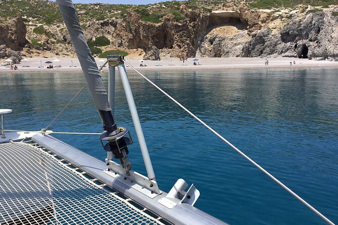 Private Full Day Catamaran Cruise From Rhodes With Food & Drinks - Additional Details and Cancellation Policy