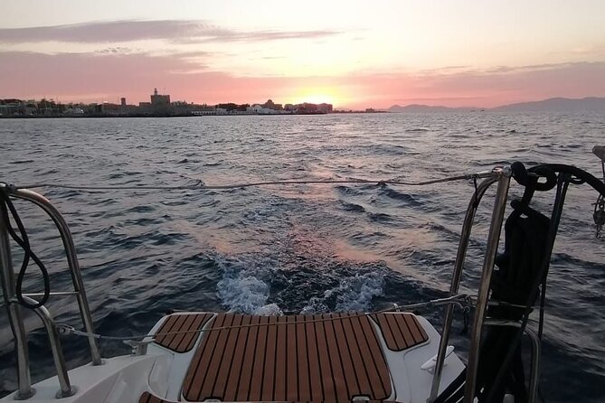 Private Sunset Catamaran Cruise From Rhodes With Dinner & Drinks - Cancellation Policy and Weather-Related Considerations