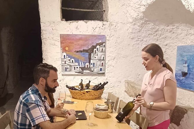 Private Wine Visit in Fira With 12 Wine Tastings and Tapas - Expert-Led Wine Education Session
