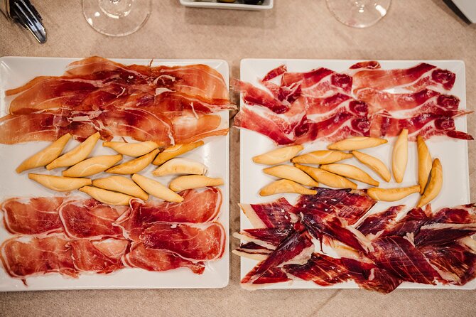 Sagrada Familia Jamón, Cheese and Wine Experience - Booking Information and Pricing Details