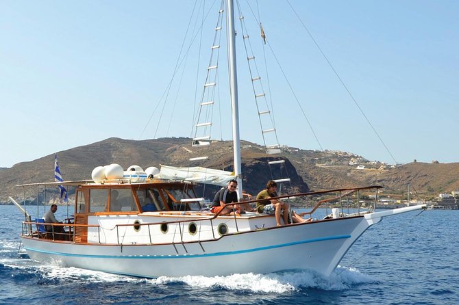 Santorini Caldera Sunset Traditional Cruise With Meal and Drinks - The Sum Up
