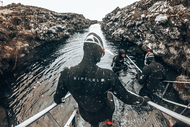 Silfra Wetsuit Snorkeling - Meet on Location Free Photos - Cold Water Experience and Underwater Views