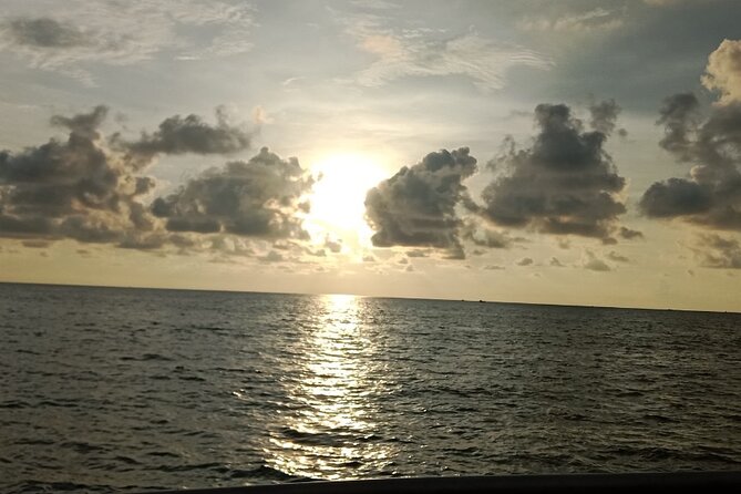 SUNSET Boat Trip-Seafood BBQ Dinner on Cruise-Night Squid Fishing - The Sum Up