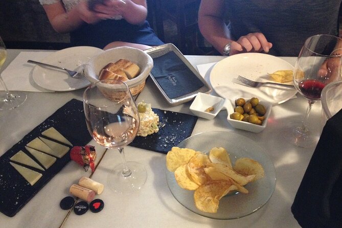 Valencia Wine Tasting and Tapas Experience - Cancellation Policy and Booking Details