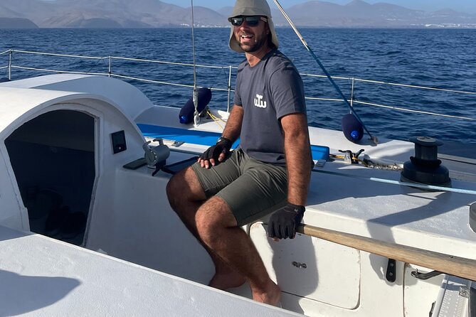 Whale & Dolphin Observation on Silent Catamaran With Hydrophone - Professional Guides