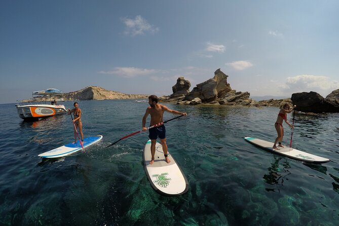3 Hours by Boat With Paddle Surf Course, Snorkel and More - The Sum Up