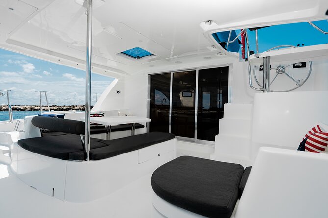 8-Hour Private 44 Leopard Catamaran Tour to Cozumel Beach W/Food & Open Bar - Confirmation and Accessibility