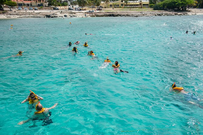 Aruba Champagne Breakfast and Lunch Cruise With Snorkeling - Logistics and Check-in Details