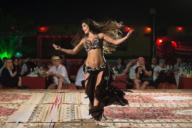 Dubai: Red Dunes, Sandsurf, Camel Ride, BBQ Dinner at Desert Camp - Cancellation Policy and Traveler Reviews