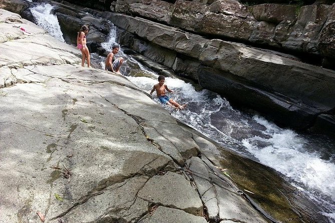 El Yunque Rainforest Tour With Water Slide, Waterfall, Shopping and Beach Time - Tour Overview and Inclusions