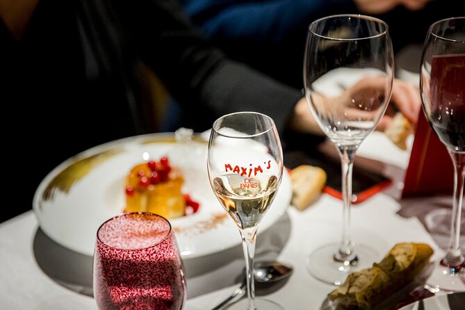 Seine River Dinner Cruise Maxims De Paris With Champagne and Live Music - Cruise Highlights