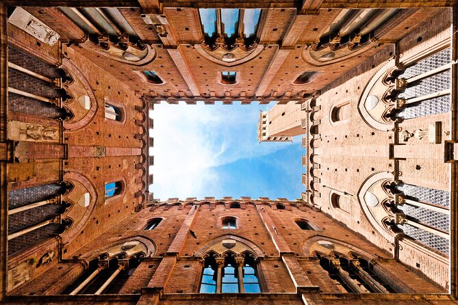 Siena and San Gimignano and Chianti Wine Small-Group Tour From Pisa - Wine Tasting at an Ancient Winery