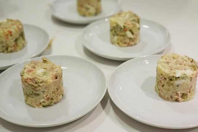 Small Group Cooking Class of Tapas and Paella in Madrid - Cancellation Policy