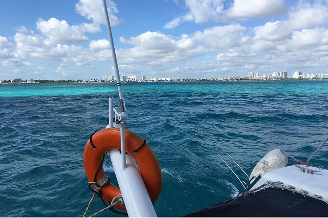 Catamaran to Isla Mujeres, Open Bar, Buffet, Beach Club Included - Common Questions