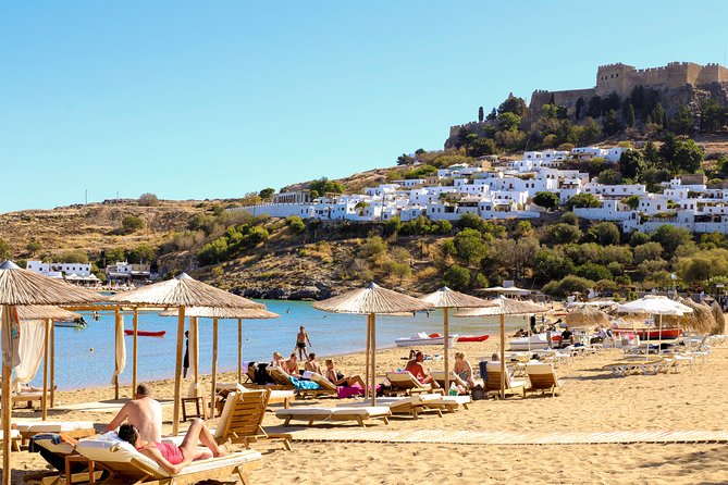 Lindos Day Cruise From Rhodes Town With Swimming Stops and Hotel Transfers - The Sum Up