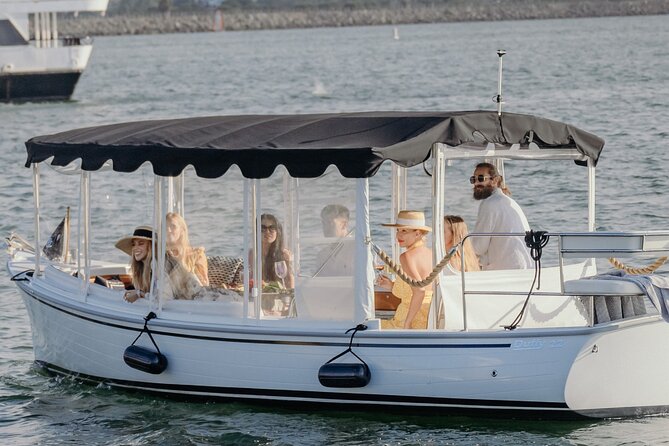 Luxury Shared E-Boat Cruise With Wine and Charcuterie Board - The Sum Up