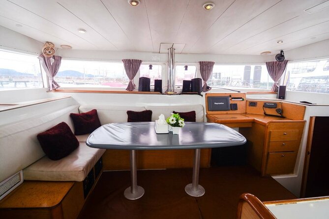 Private Catamaran Yacht to Maiton and Coral With Sunset Cruise - Professional Crew and Services