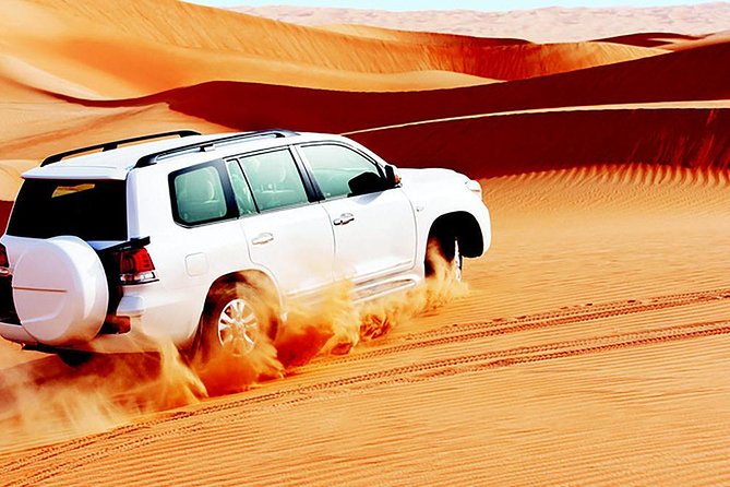 Red Dunes Safari With Sandboarding & Camel Ride From Ras Al Khayma - Witness a Breathtaking Sunset From the Highest Dune