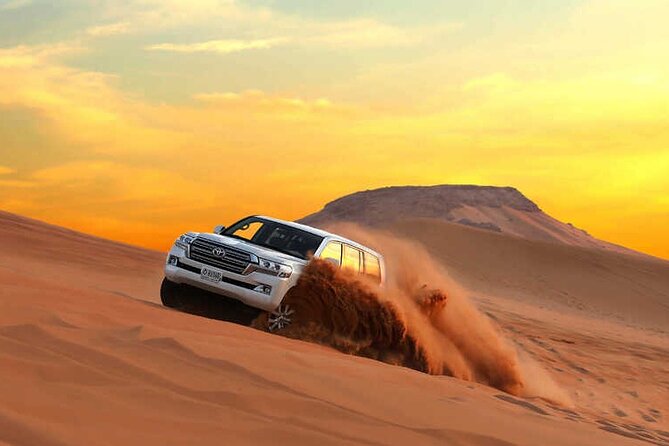 Red Sand Morning Desert Safari With Quad Bike, Sand Boarding & Camel Ride - Sandboarding Thrills