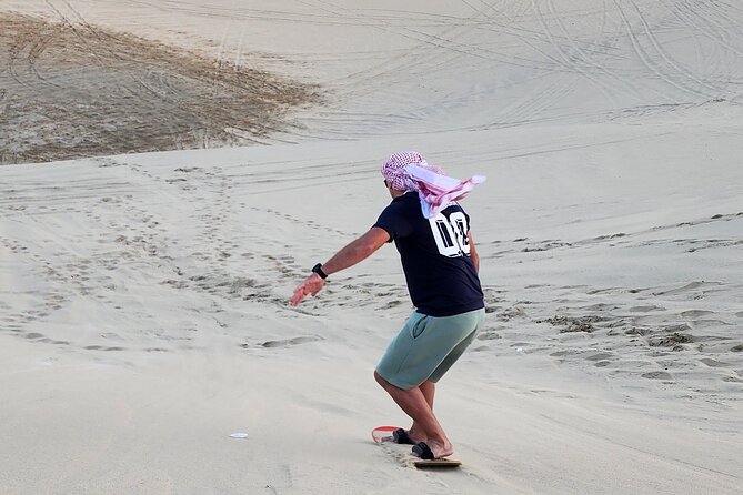 Shared Desert Safari Camel Ride Sandboarding and Inland Sea - Common Questions