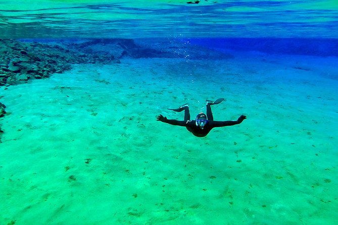 Silfra Wetsuit Snorkeling - Meet on Location Free Photos - Common Questions