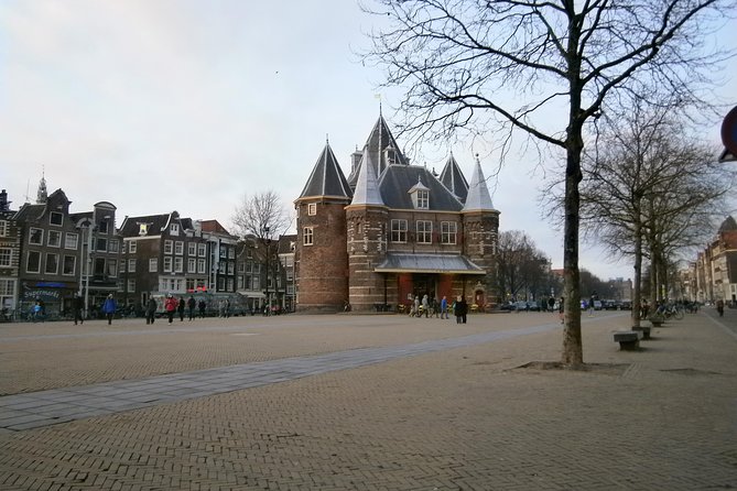 Walking Tour of 2 Hours of the Highlights of Amsterdam - Inclusions, Exclusions, and Cancellation Policy