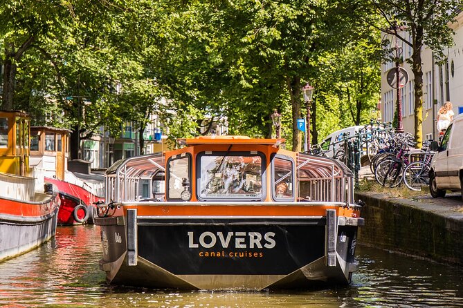 Amsterdam 1-Hour Sightseeing Canal Cruise by Semi-Open Boat - Common Questions and Booking Information