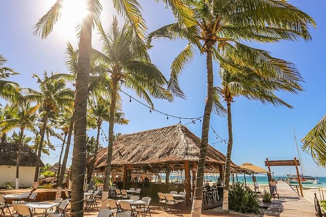 Isla Mujeres Tour: Beach Club, Snorkel & Sailing With Lunch & Bar - The Sum Up