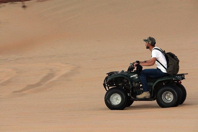 Red Sand Morning Desert Safari With Quad Bike, Sand Boarding & Camel Ride - Round-Trip Transportation Details