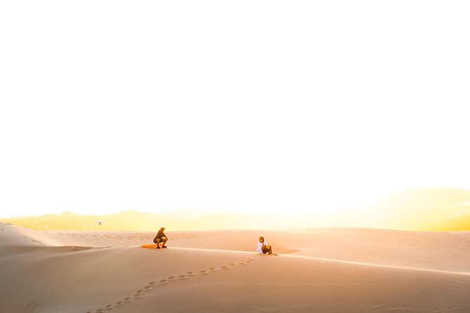 Private Sunrise Desert Safari BashingCamel RideSand BoardingInland Sea Visit. - The Sum Up
