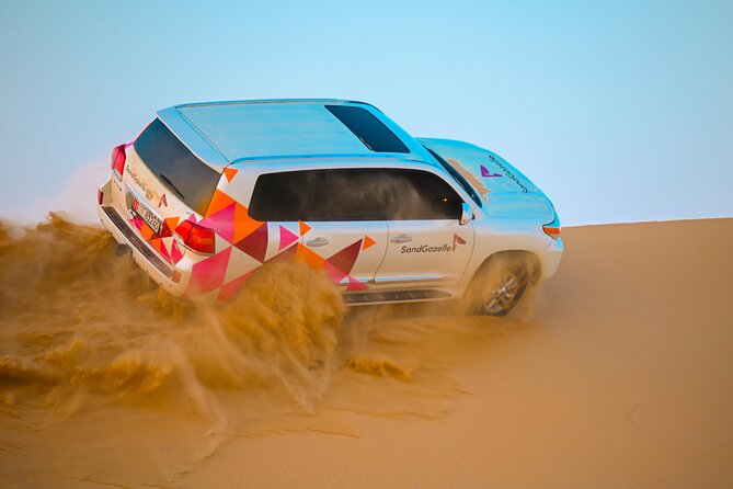 Abu Dhabi Evening Desert Safari Dune Bashing Camel Ride and BBQ