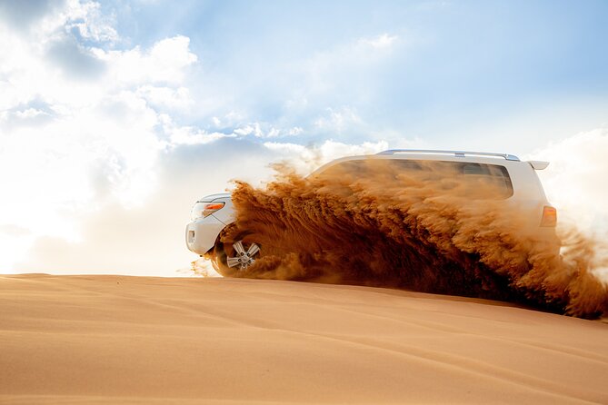 Abu Dhabi Evening Desert Safari With Camel Ride and Dinner