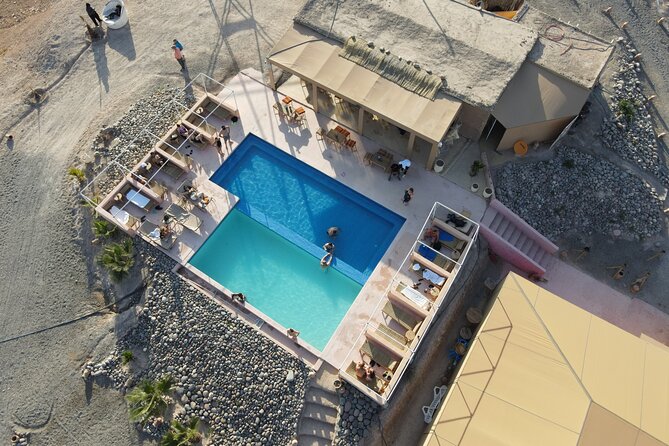 Agafay Desert Camel ARide With Dinner & Sunset Access to the Pool - Arid Landscapes and Desert Camp