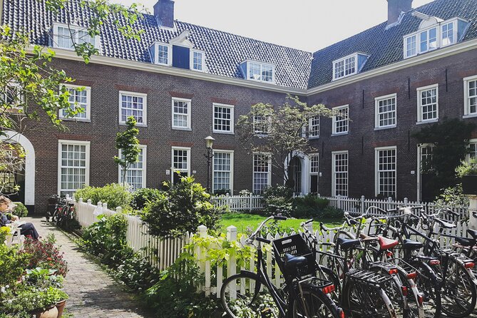 Amsterdam Must-See Bike Tour With a Local Expert Guide - Exploring the City on Two Wheels