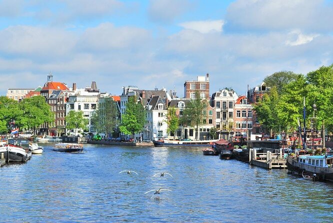 Amsterdam PRIVATE Bike Tour With Locals: Bike & Local Snack Included