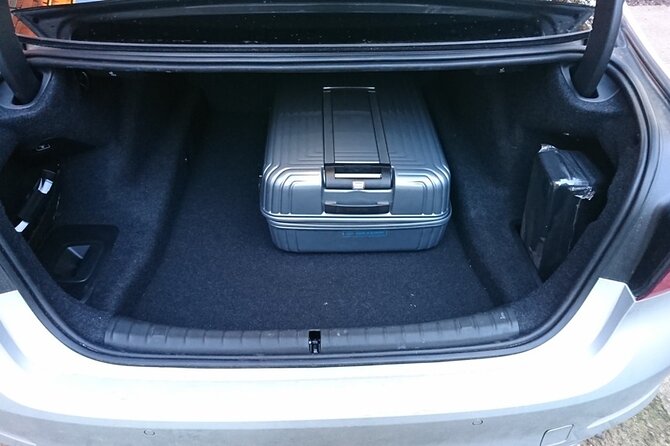 Arrival Private Transfer From Dubai Airport DWC to Dubai by Car or SUV - Pricing and Booking Details