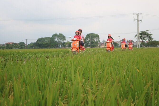 Beautiful Female Riders Vespa Red River Countryside Tour 5 Hours
