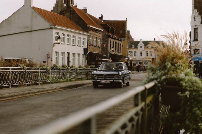 Bruges Castle Roadtrip: A Vintage Car Adventure